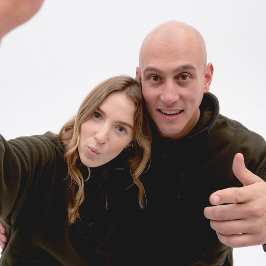 couple wearing fleece selfie