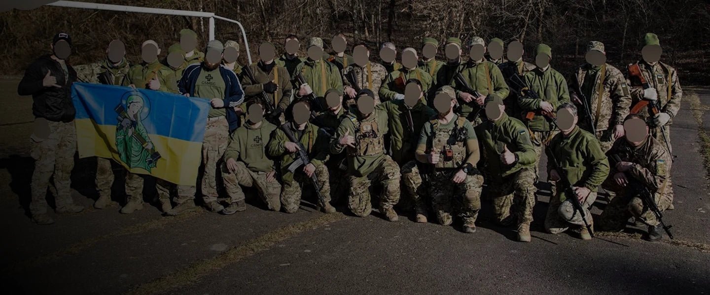 GSMSG trainers with the Ukrainian Armed Forces and a Saint Javelin flag