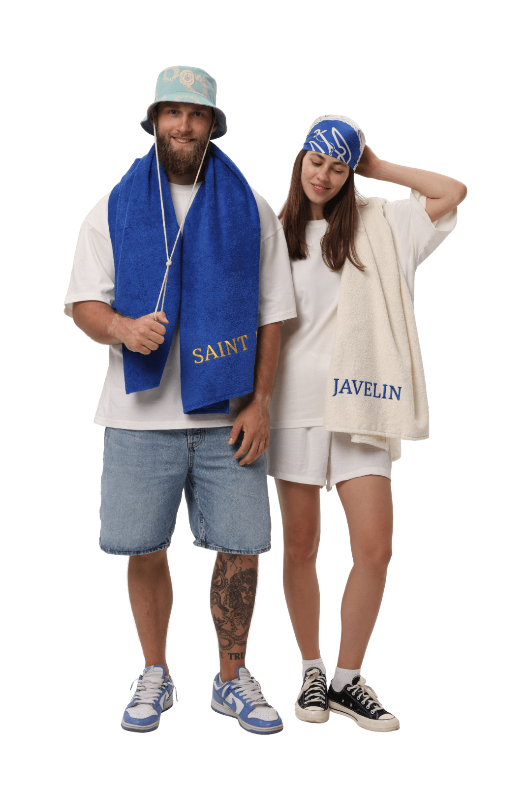 Two models wearing Saint Javelin beach towels, royal blue and bone
